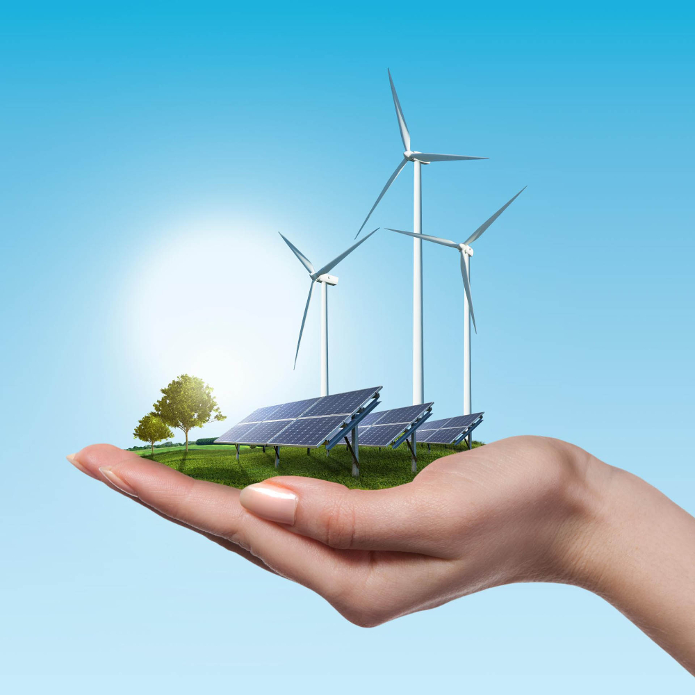 wind-turbines-solar-panels-meadow-with-tree-holds-woman-s-hand-against-blue-sky-clouds